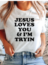 Load image into Gallery viewer, Jesus Loves You And I’m Tryin Tee
